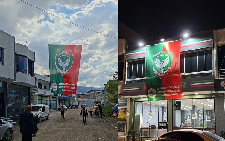 Li Bursayê piştgiriya Amedsporê: Alayên kesk û sor li avahiyan hatin daliqandin