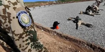 Almanya: Metirsiya DAIŞê li Iraqê kêm bûye, lê gefa komên çekdar maye