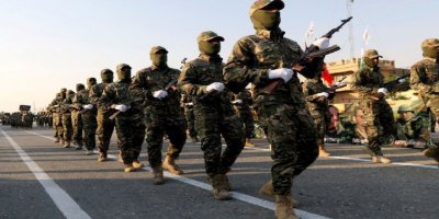 Şêwirmendekî Trump: Nabe çek di destê mîlîsên Iraqê de bimînin