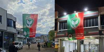 Li Bursayê piştgiriya Amedsporê: Alayên kesk û sor li avahiyan hatin daliqandin