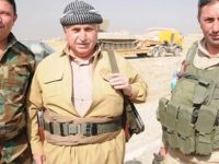 Pêşmergeyê 72 salî bi 4 zarokên xwe li cephayê Mûsilê ye